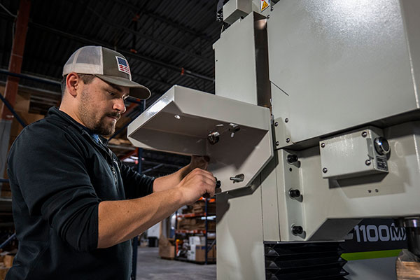 Tormach technician assembling a Tormach Mill