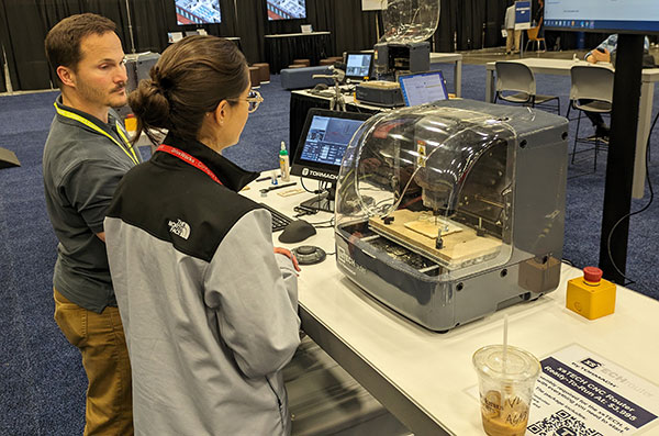 A Tormach instructor giving a lesson on-site