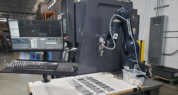 Parker Medical uses a 1500MX CNC mill and a ZA6 robot for automation