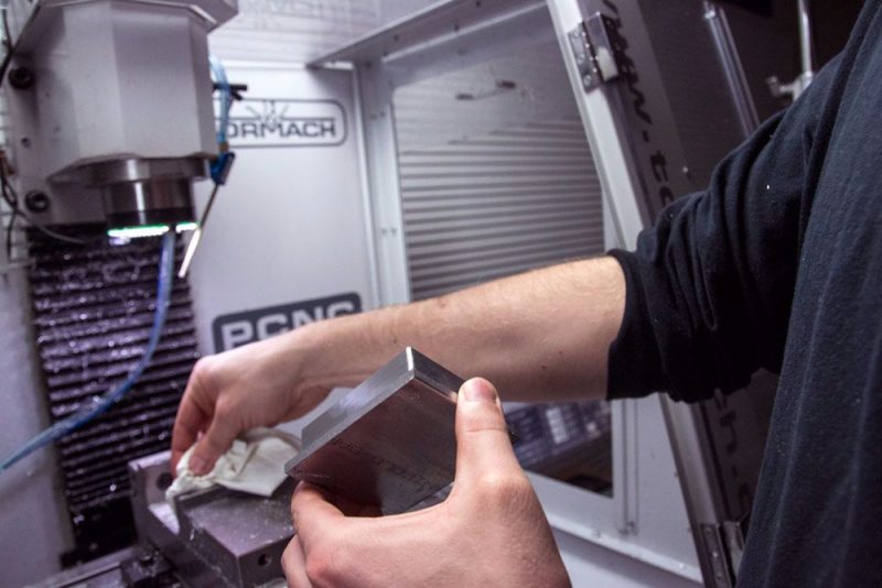 cleaning the vise before changing the position on a part - Tormach mill
