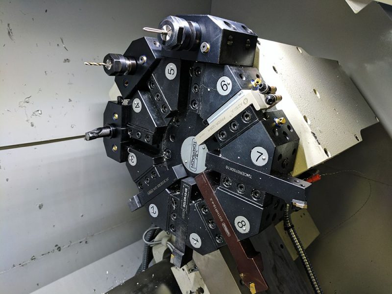 Tormach lathe setup for cutting an aluminum yo-yo piece