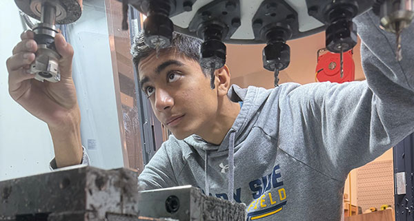 The Shady Side Academy FIRST Robotics team uses a 770M to make parts