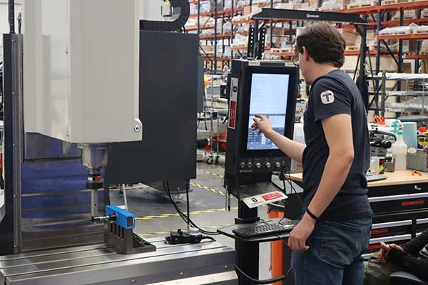 employee owner assembling 770MX mill